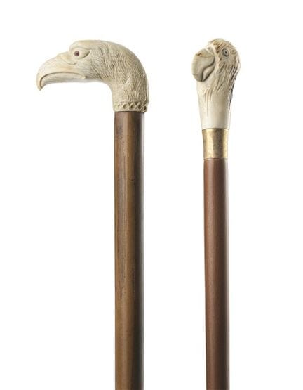 19th-20th century art. Two walking sticks with mal