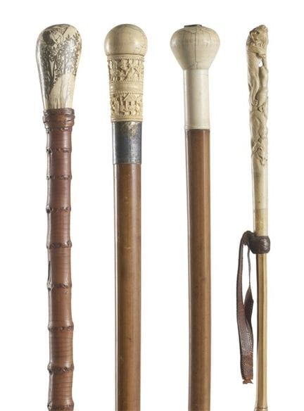 19th-20th-century art. Four walking sticks with iv