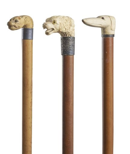 19th-century art. Lot of three walking sticks with