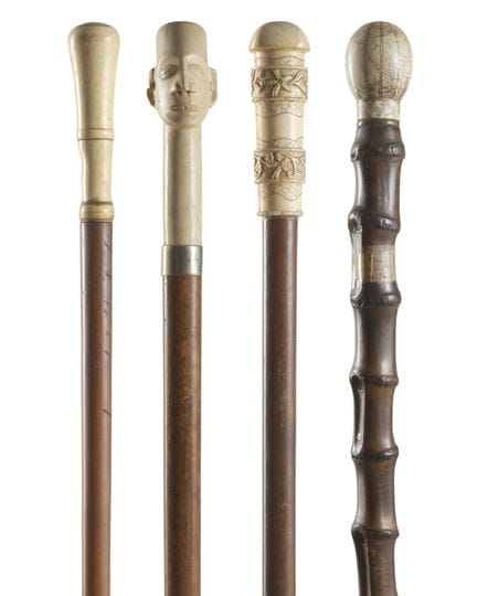 19th-20th-century art. Four walking sticks with iv