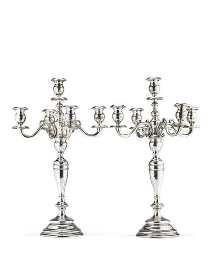 * Par de candelabros de plata de cinco luces con b