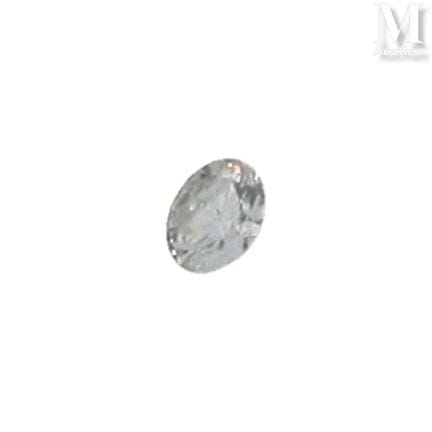 A brilliant-cut diamond on paper weighing approxim
