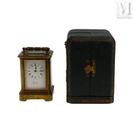 Rectangular metal table clock with a white enamele