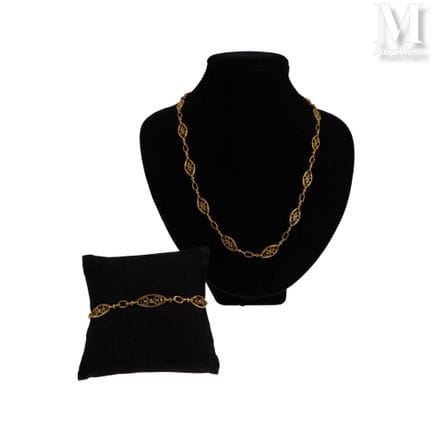 18k yellow gold (750°/°°) set consisting of a brac