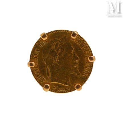 Bague pièce
Bague en or jaune 18K (750°/°°) retena