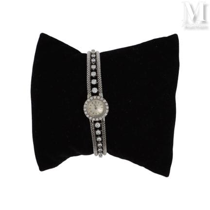 OMEGA
Montre bracelet de dame en or gris 18K (750°