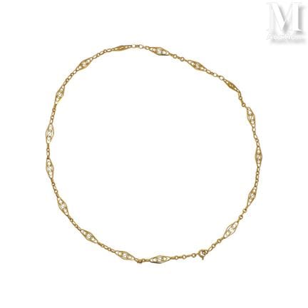 18K yellow gold (750°/°°) choker necklace, featuri