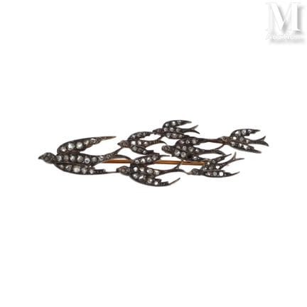 Broche oiseaux
Broche en or rose 18K (750°/°°) et 