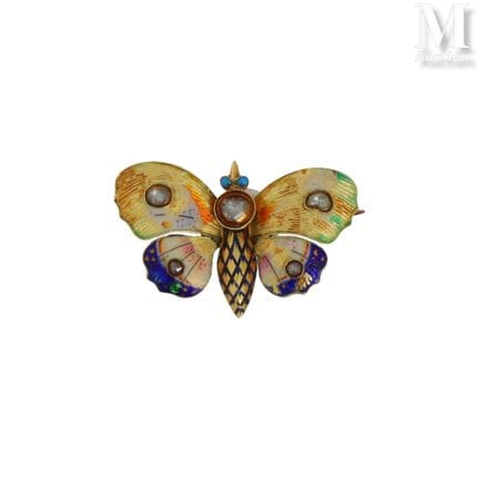Broche en alliage d'or 14k (585°/°°) stylisant un 