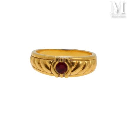 18K yellow gold ring (750°/°°) set with a round-cu