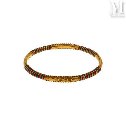 Enamel Bangle
21k yellow gold bangle, hallmarked 1
