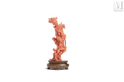 CHINE, XXe siècle
Branche de corail orange* sculpt