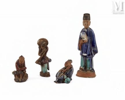 VIETNAM, XXe siècle
Ensemble de quatre pièces en g