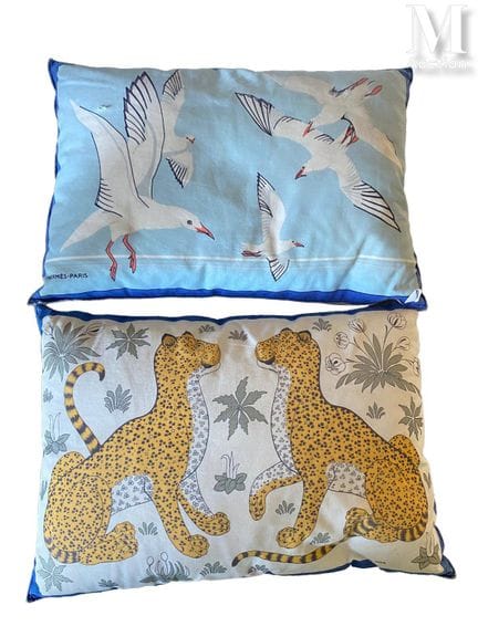 HERMÈS PARIS
Two printed silk cushions, one featur
