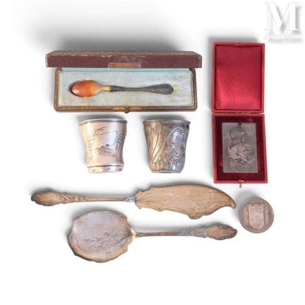 Silver set: cups, scoops, a porridge spoon, and si
