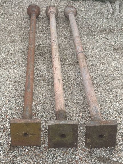 Three old cast-iron posts. Height 5 m, shaft 0.15 