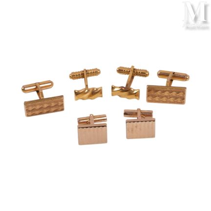 Three cufflinks: one gold and two metal