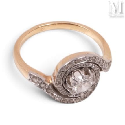Gold tourbillon ring, set with a diamond in the ce