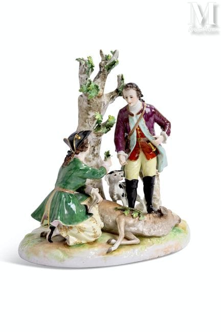 Conjunto de porcelana
blanca con decoración policr