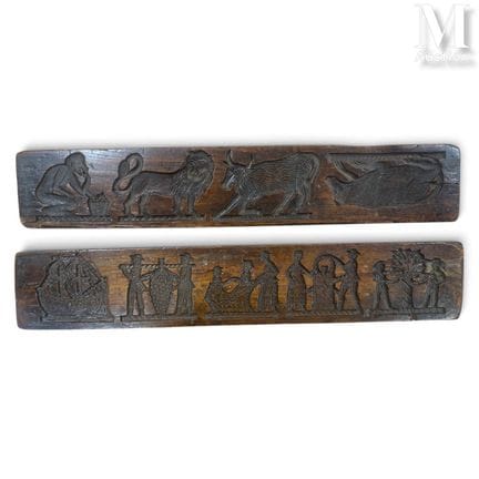 两块饼干板或“koekplank”，18世纪佛兰德斯
一对矩形胡桃木板，表面平雕有帆船、迦南葡萄搬运