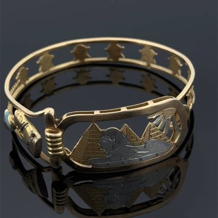 Bracciale rigido apribile in oro giallo e oro bian