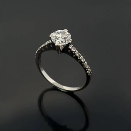Anello solitario in oro bianco (750) con pietre bi