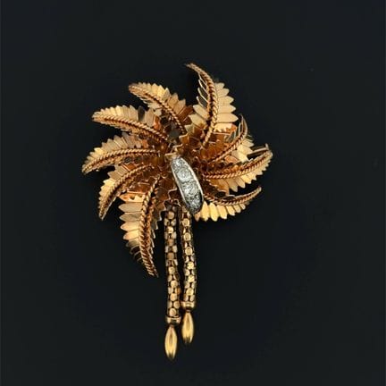 Broche "palmier" en or jaune (750) ajourée, torsad
