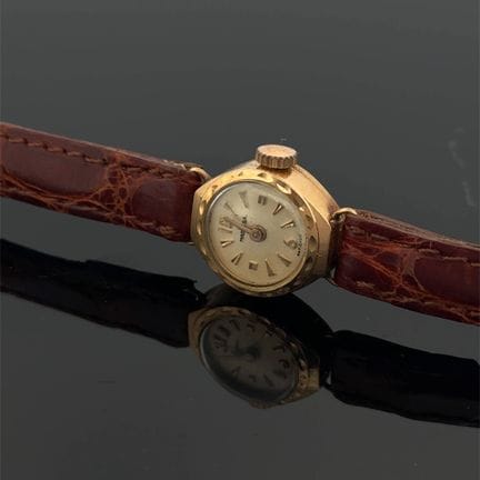Orologio da donna rotondo con cassa in oro giallo 