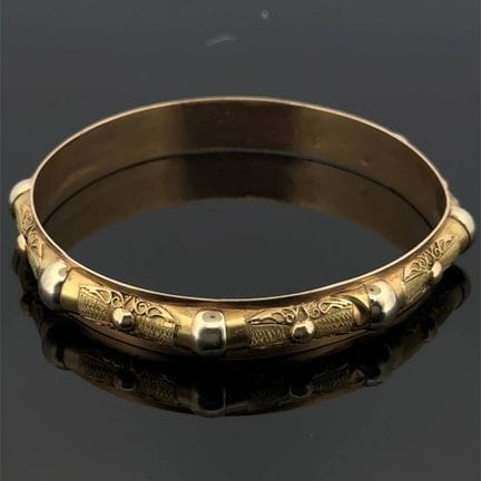 Bracciale rigido in tre tipi di oro (750) parzialm