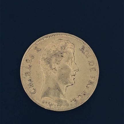 Charles X 
40 francs or 1830 A, tranche en creux. 