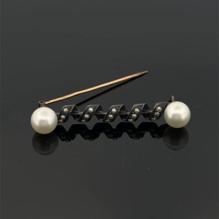 Broche "barrette" en or jaune (750) et argent (min