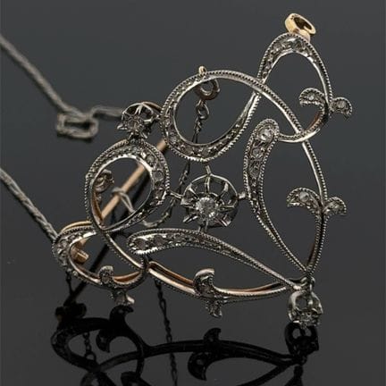 Broche-pendentif en or jaune (750) et platine (min