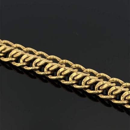 Bracciale in oro giallo e oro bianco (750) con mag