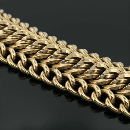 Bracciale a manicotto in oro giallo (750) traforat