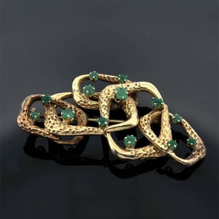 Broche en or jaune (585) 14 carats, ajourée, parti