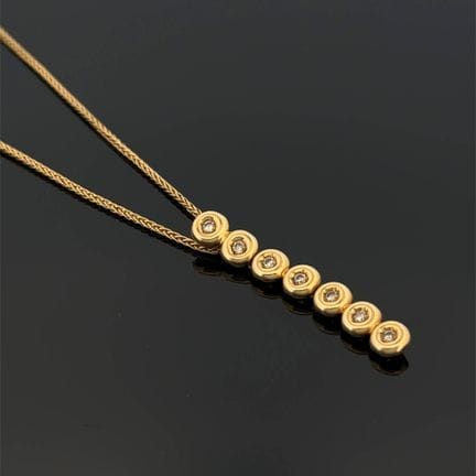 Collana in oro giallo (750) con maglia a palma, su