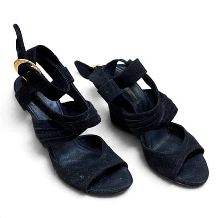 LOUIS VUITTON 
Coppia di sandali con zeppa in pell