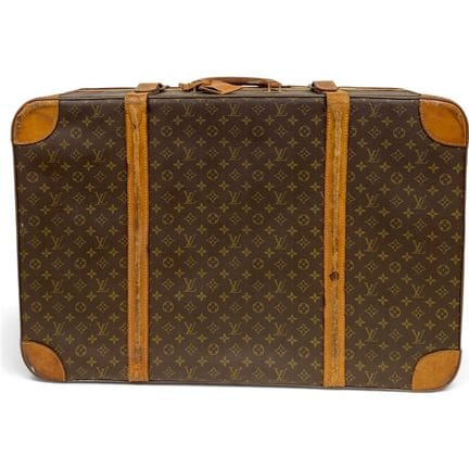 Louis Vuitton
Maleta de lona Monogram y cuero natu