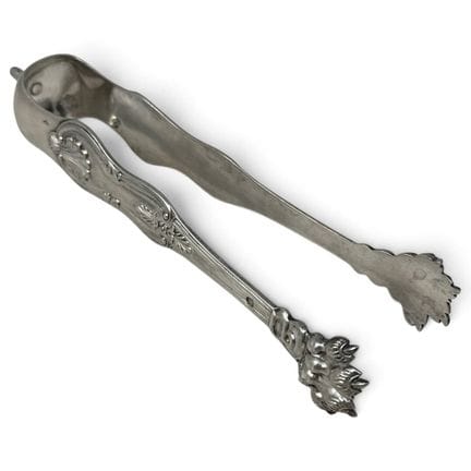 Pince à sucre en argent (950) à décor de coquilles