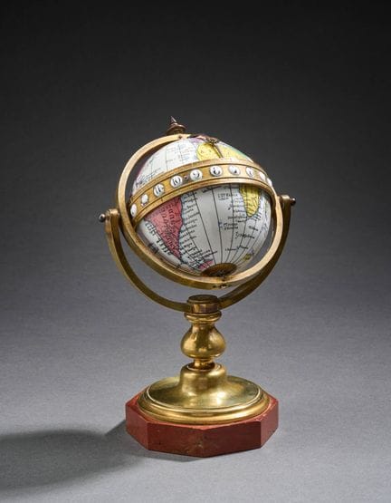 GLOBE UHR 
Drehbarer, emaillierter Globus mit Mono