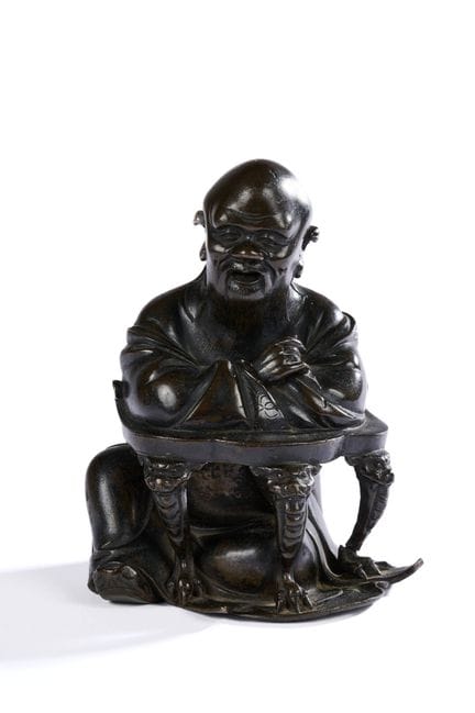 CINA - Intorno al 1900
Gruppo in bronzo con patina
