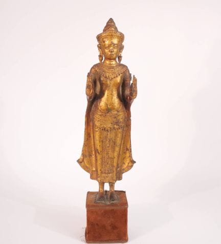 THAILAND, 
Standing Buddha, clad in a monk’s robe,