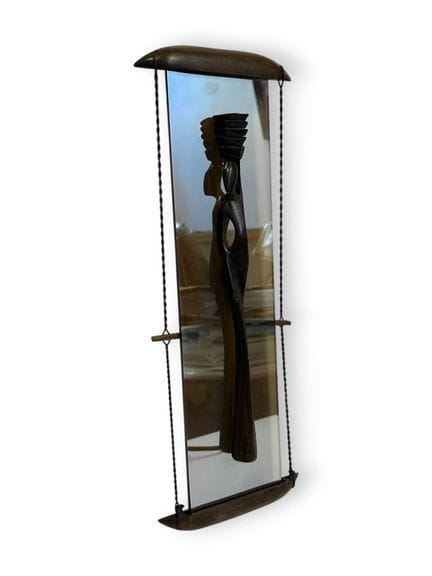 Modern School, 
Sculpture of a woman carrying a bu