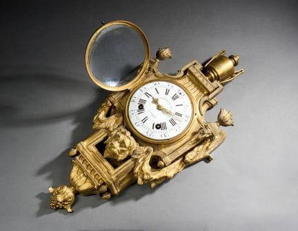 Cartel d'applique Louis XVI en bronze doré au masc