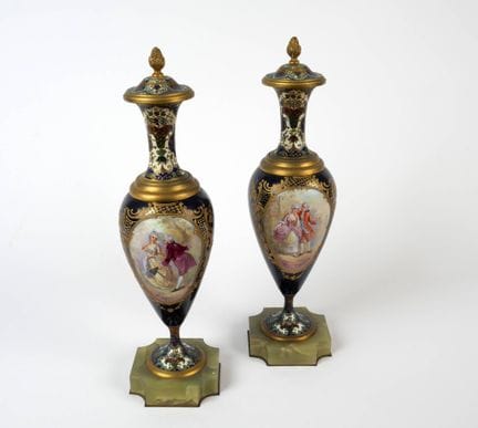 Pair of lidded porcelain vases in the Sèvres style