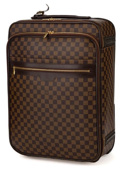 Valise « Louis Vuitton »

Valise à roulettes pour 