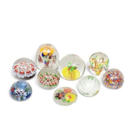 Nine glass paperweights, 20th century; some with m