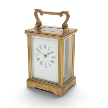 Orologio da viaggio in ottone, 1900 circa. Realizz
