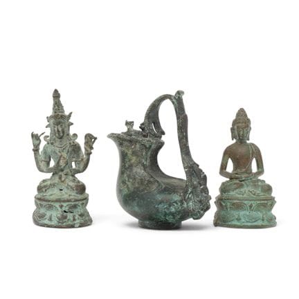India, two green-patinated Buddhas and a pouring v