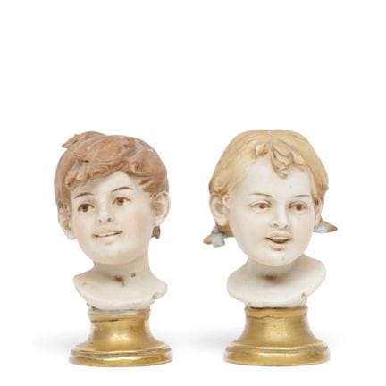 Pair of miniature bisque busts, a boy and a girl, 